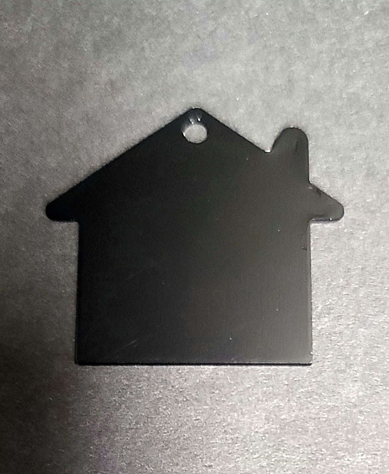 Create your own custom House Shaped Tag with your design, logo, or text.
